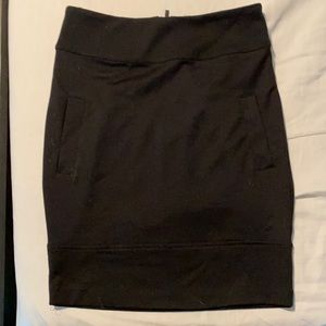 Black pencil skirt faux pockets